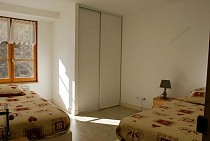 Chalet Milliat - slaapkamer met kast en 2 2-persoonsbedden